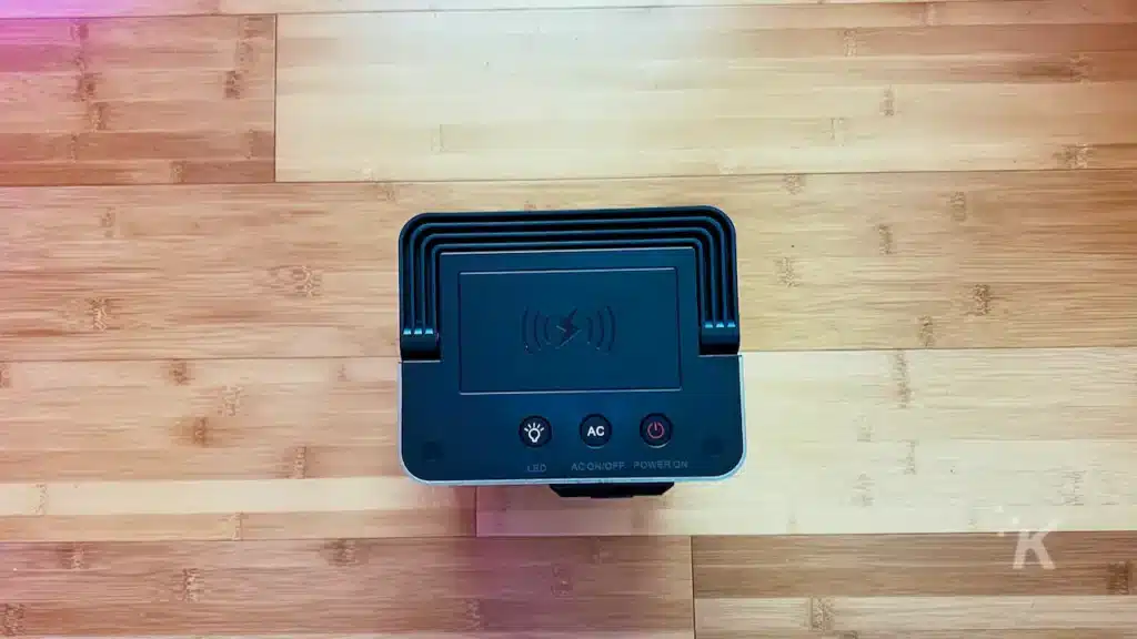 Image of the top of a portable power station on hardwood floor