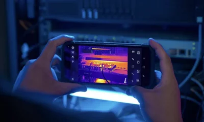 person holding a doogee s98 pro rugged phone