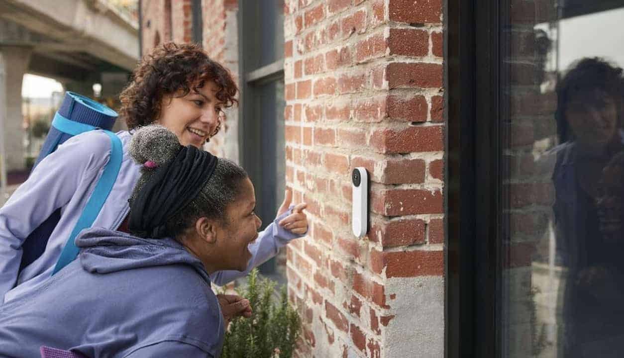 Image of people ringing a google nest doorbell