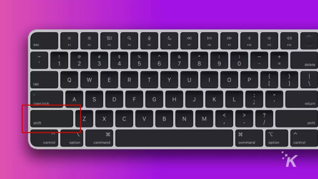 mac keyboard with shift key highlighted