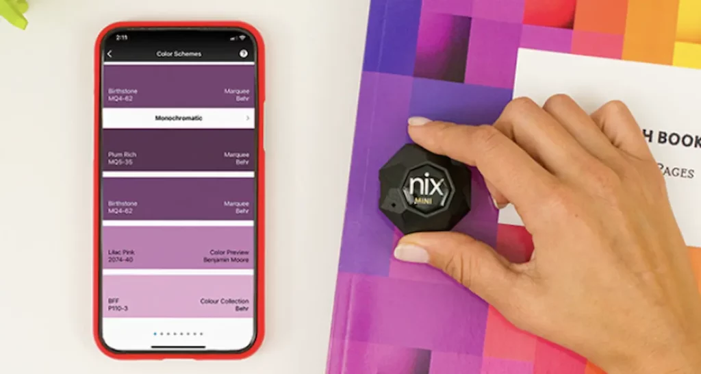 image of Nix color sensor with smartphone and hand