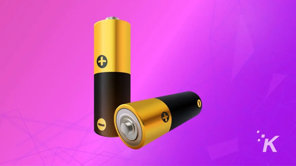 AA batteries on purple background