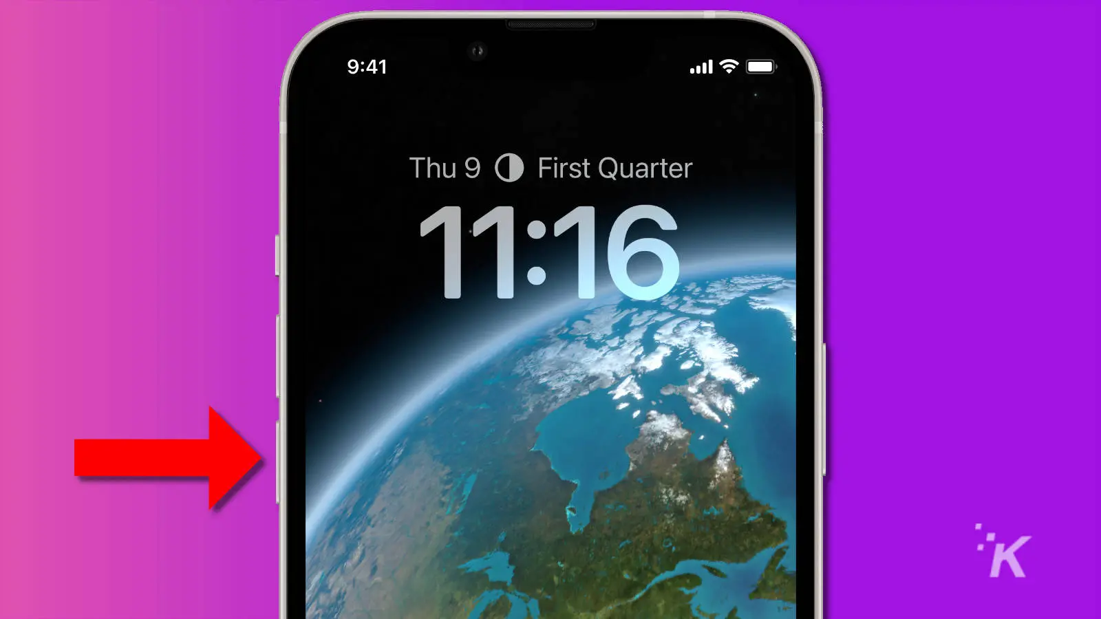 image of an iphone 13 with a red arrow pointing at the volume down button