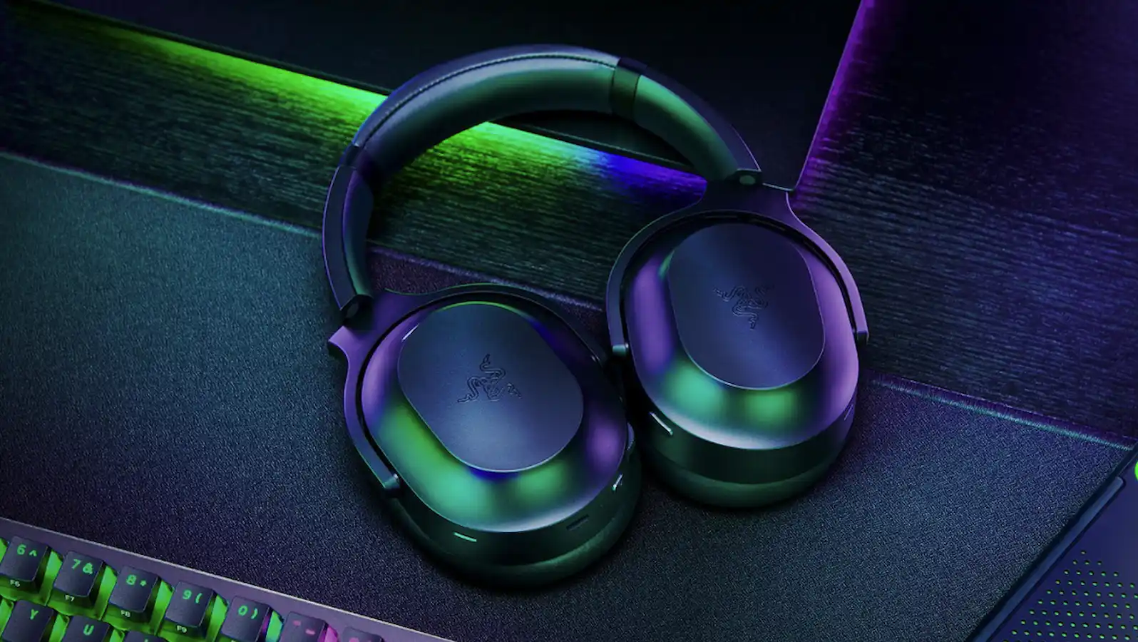 Image of a razer barracuda pro gaming headset on gaming desk