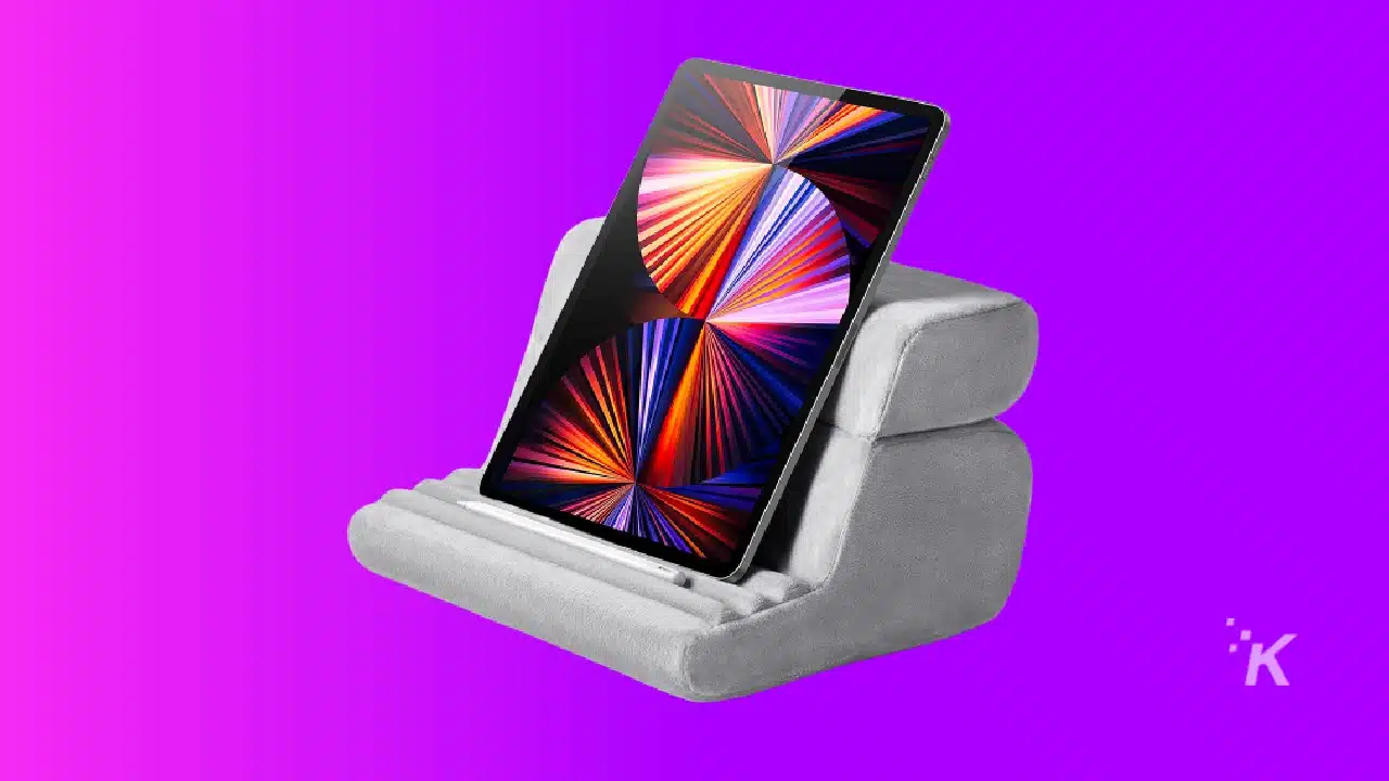 Image of a ugreen tablet pillow stand on purple background