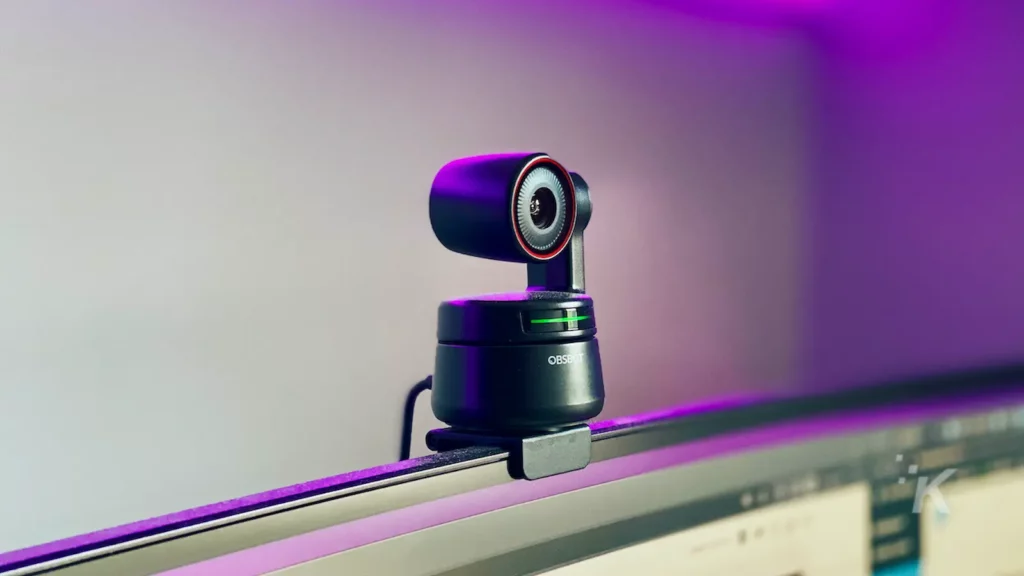 4k webcam attached to a monitor with purple light background