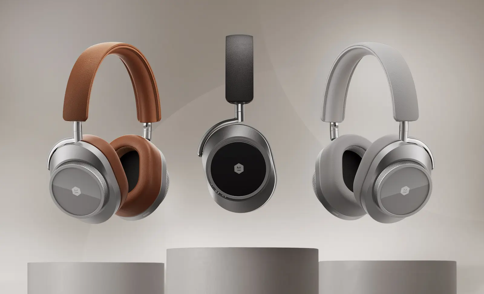 master and dynamic mw75 headphones in gray, black, and brown