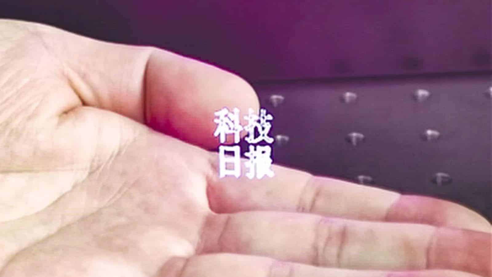 Laser hologram spelling letters on hand