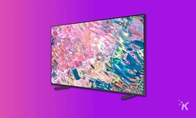 samsung qn55q60b qled tv on purple background