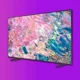 samsung qn55q60b qled tv on purple background