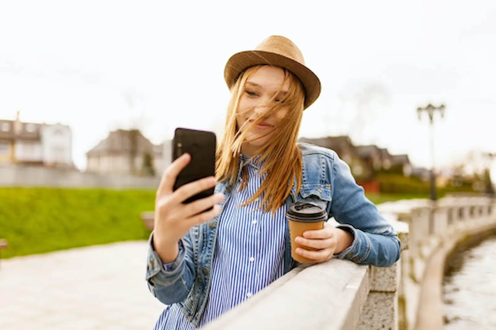 Girl taking a selfie with her phone