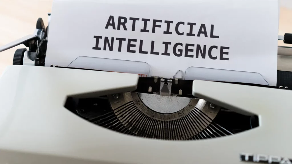 typewriter with the words artificial intelligence AI