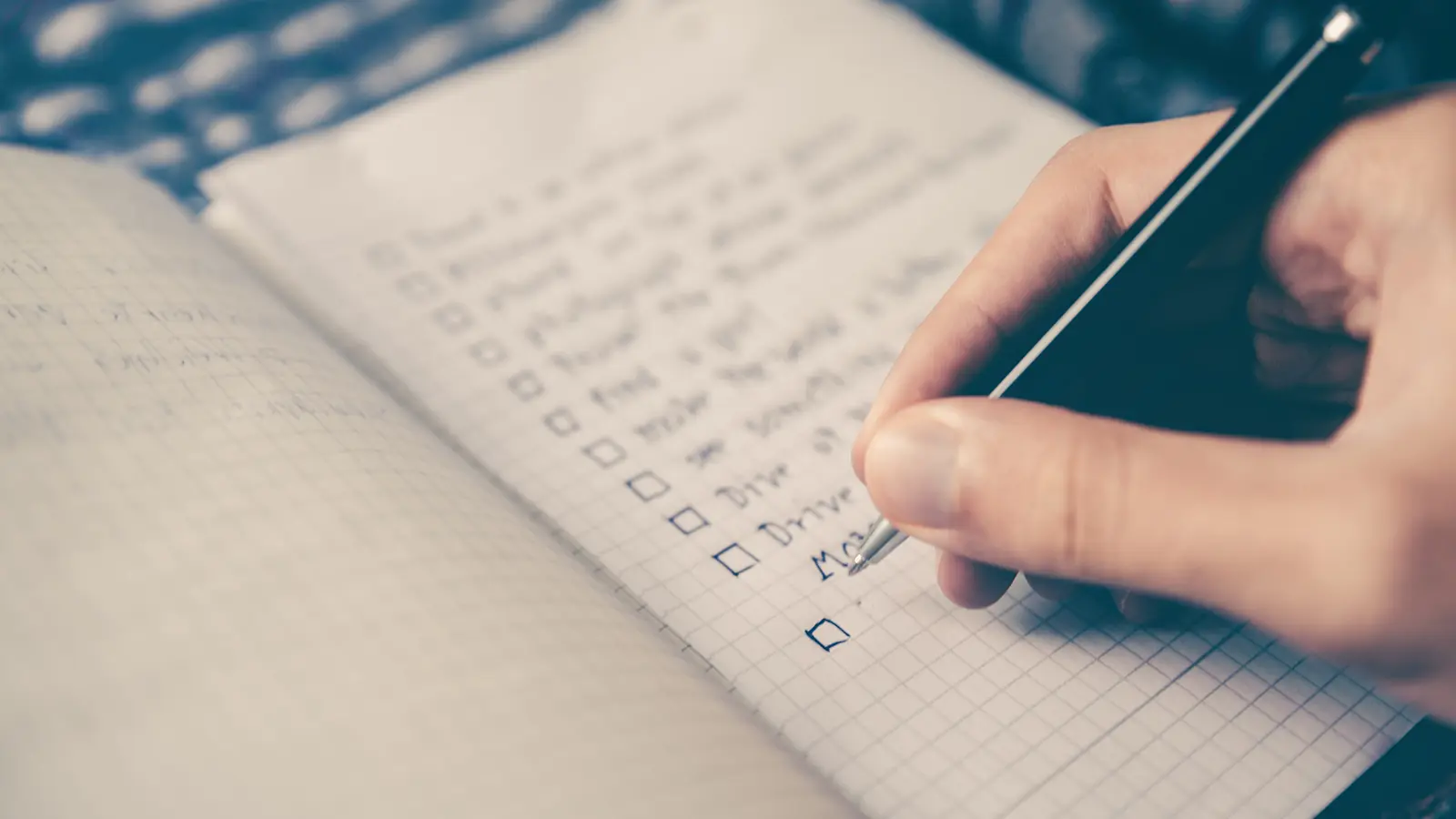 checking off a list with a pen to be better