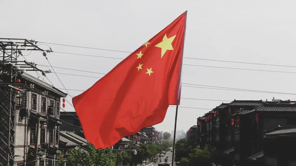 Chinese flag blowing in wind