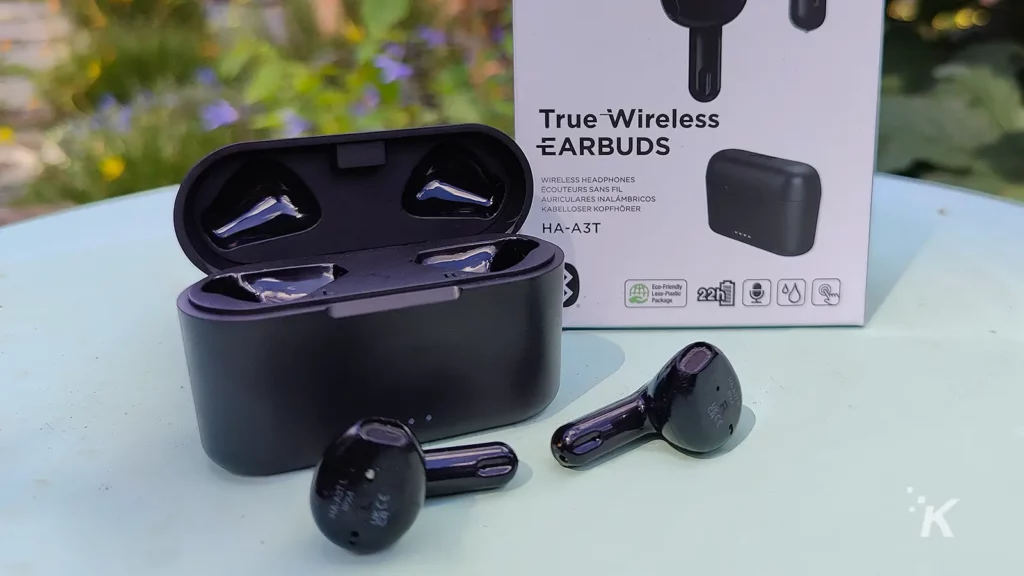 jvc wireless earbuds on table