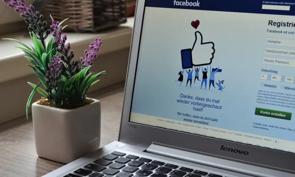 laptop with the facebook page opened