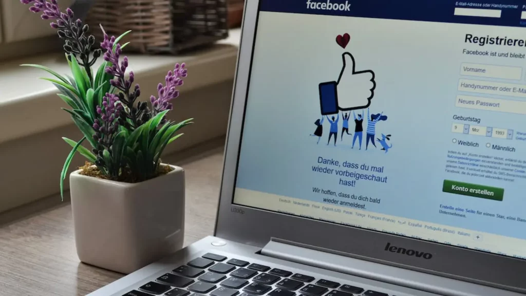 Laptop with the facebook page opened