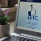 laptop with the facebook page opened