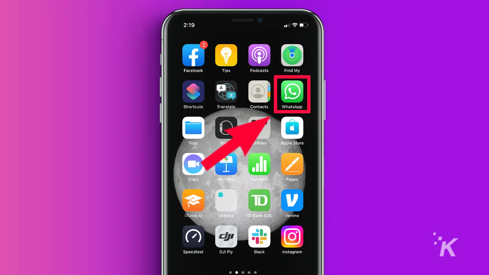 iPhone with arrow pointing to WhatsApp