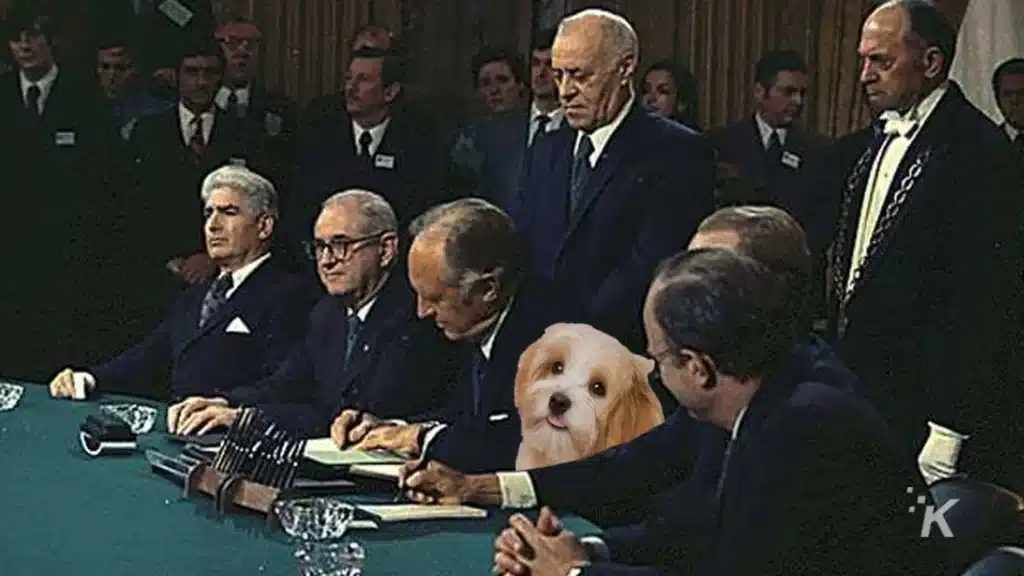 paris peace accords with a dog in the picture for a facebook group