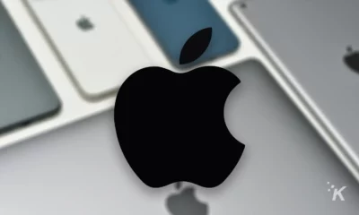 Apple logo black blurry background