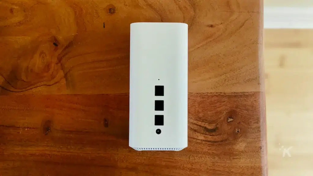 the back of a vilo mesh wifi router for mesh networks on entertainment center