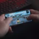 hands gaming on phone
