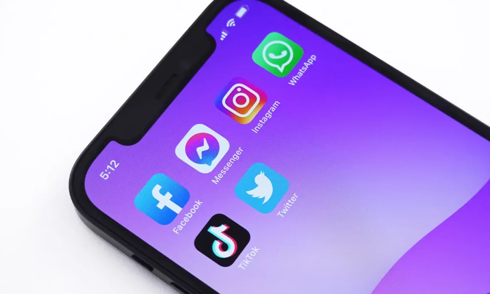 tik tok and other social apps on a phone screen