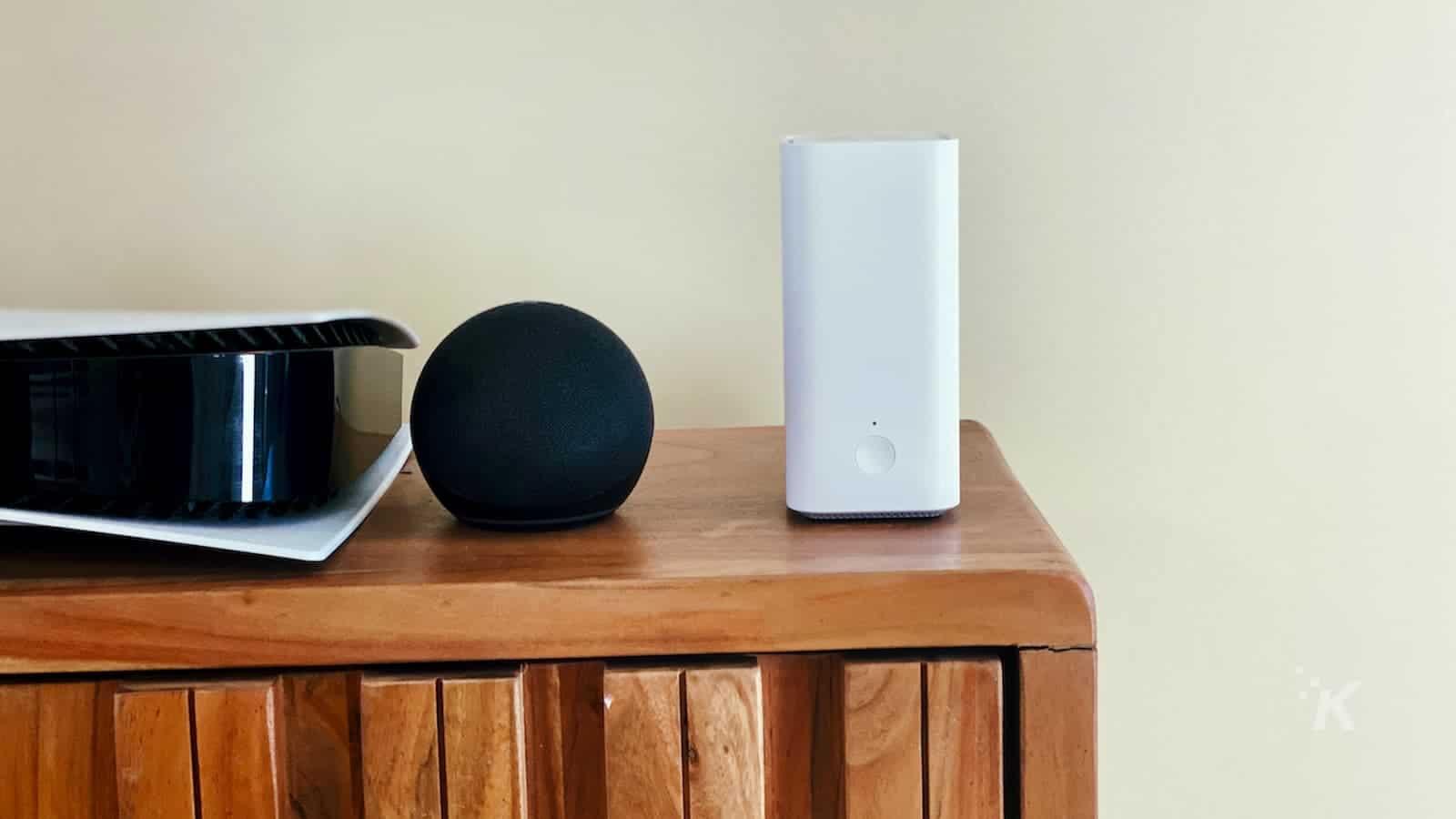 image of vilo mesh wifi system next to echo dot and ps5