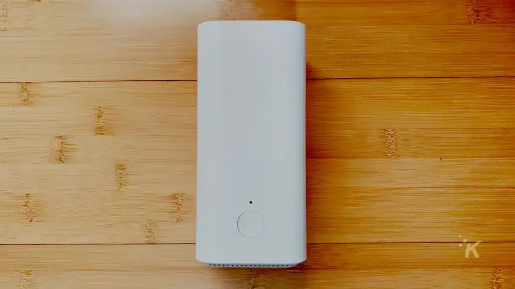 vilo wifi router laying on hardwood floor