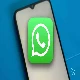 whatsapp icon on blurred smartphone background