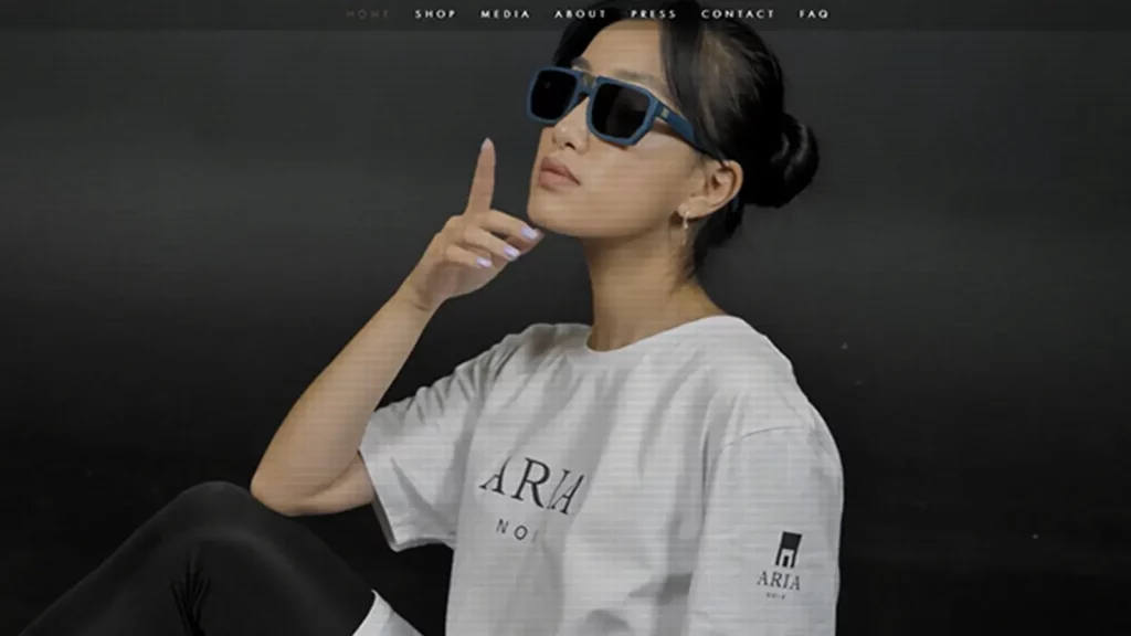 Aria noir model wearing sunglasses