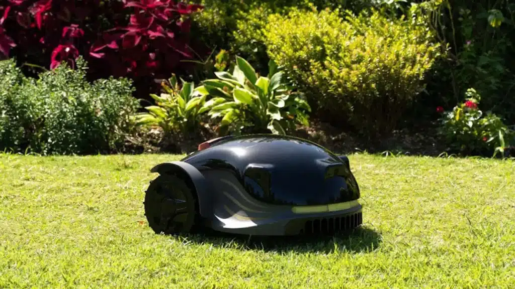Conga AI robotic lawn mower in the grass yard