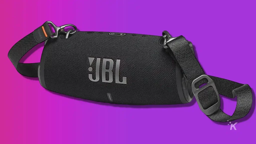 Jbl xtreme 3 bluetooth speaker on purple background