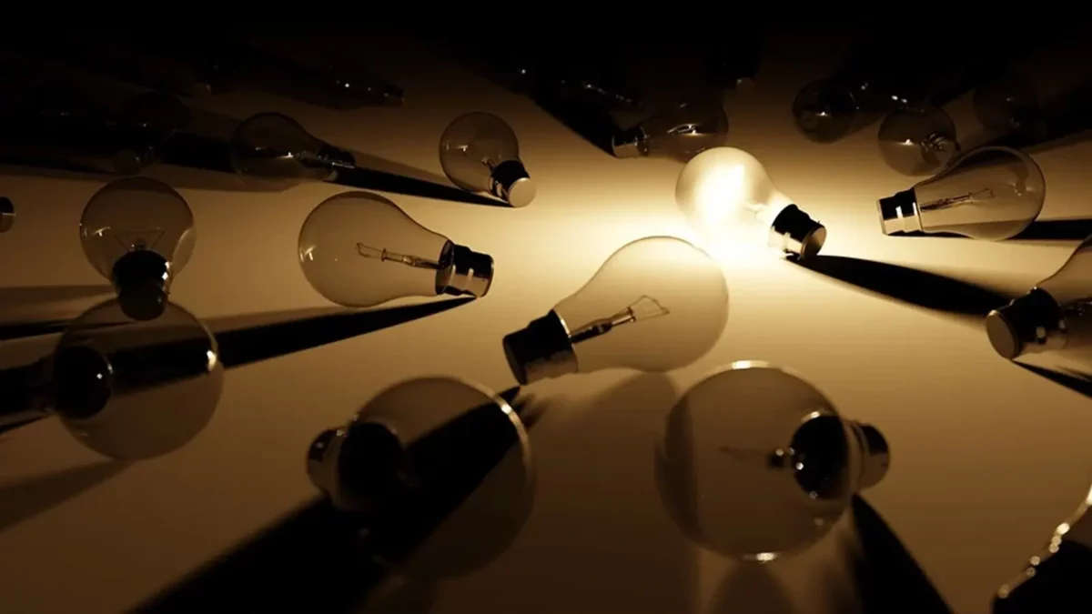 light bulbs on the ground one is on