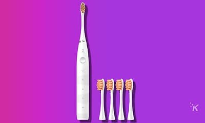 oclean flow toothbrush on purple background