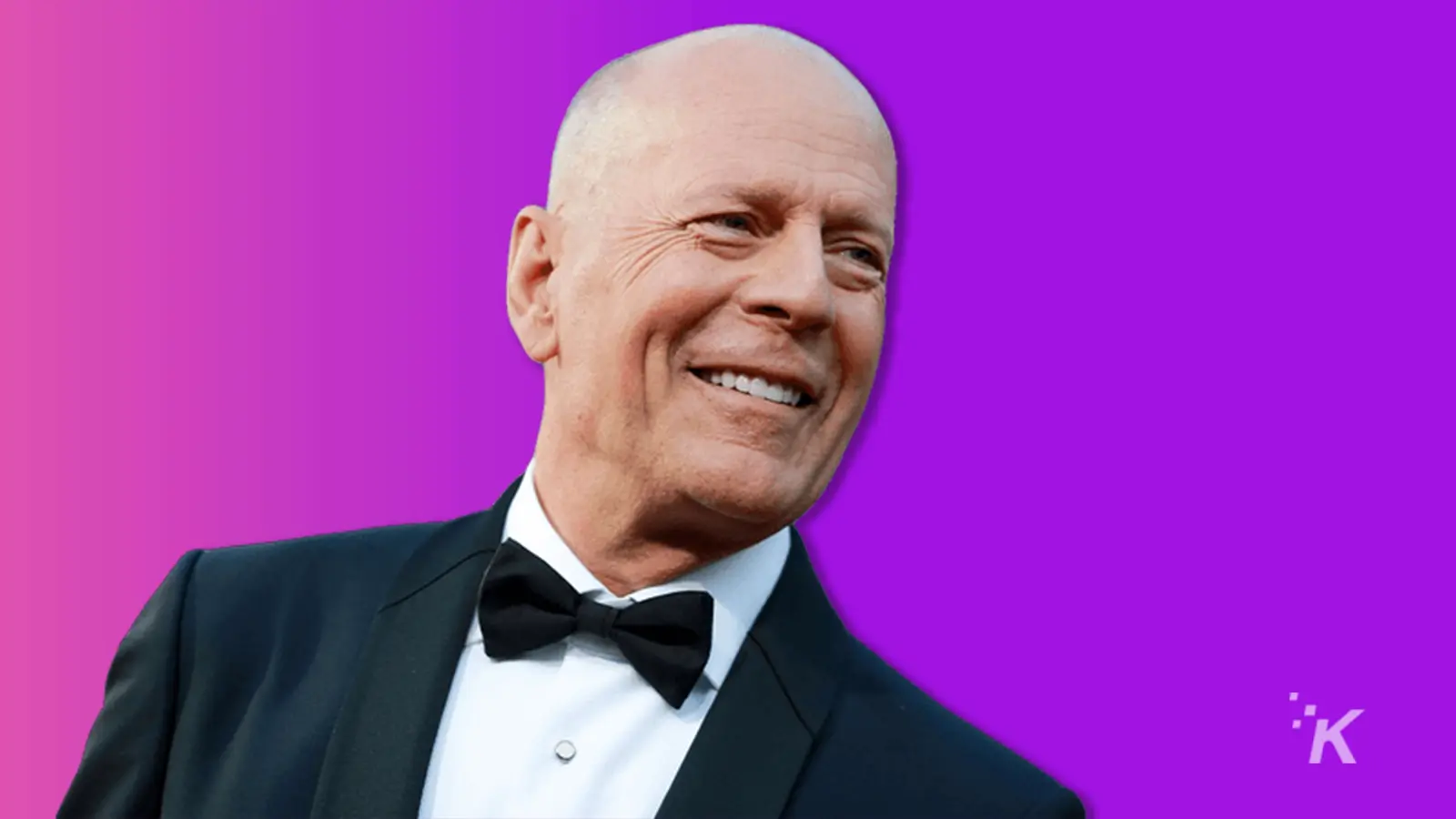 Bruce Willis in a suit on a purple background