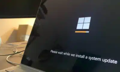 Windows 10 updating on a computer screen with logo