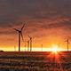 wind turbines during a sunset