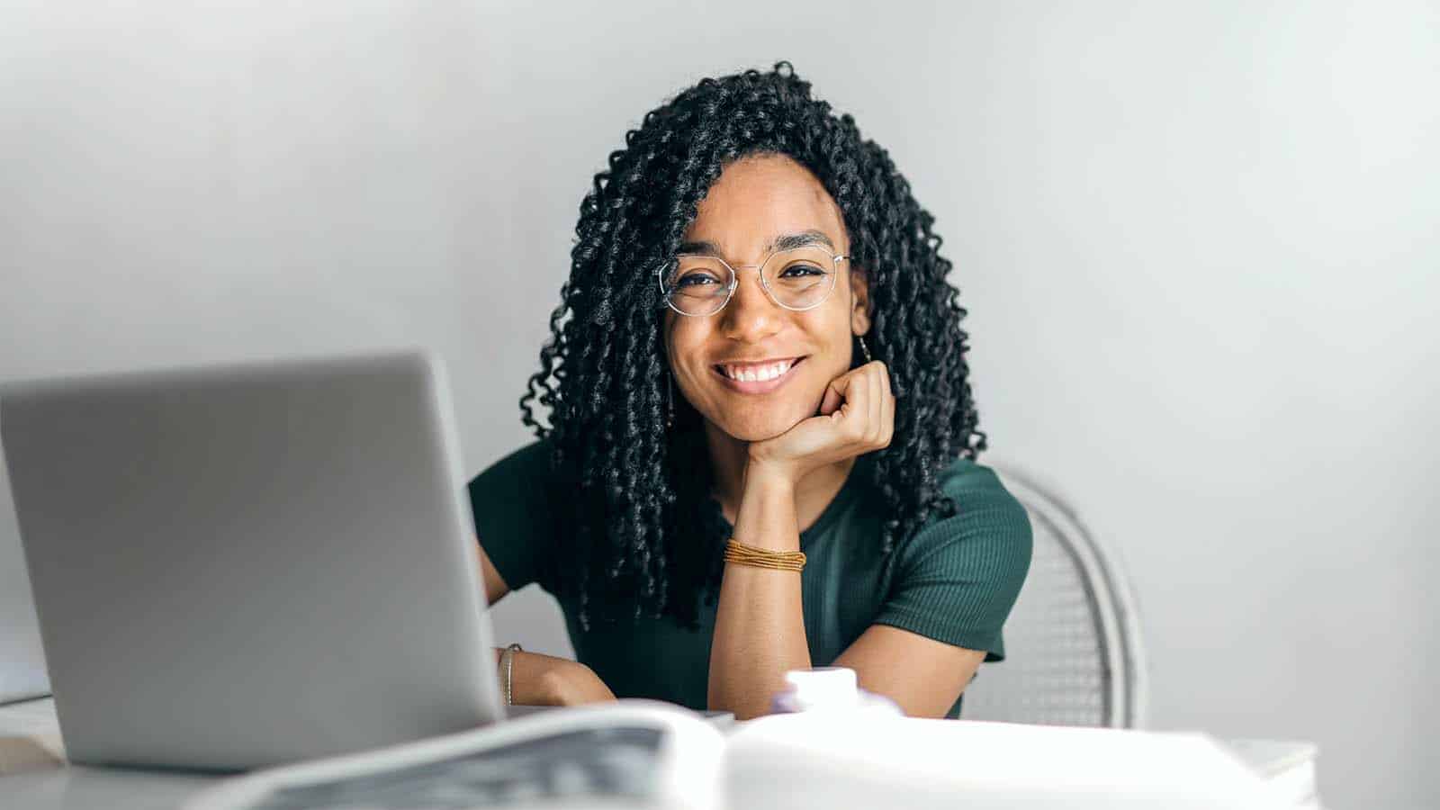 student in front of a laptop.