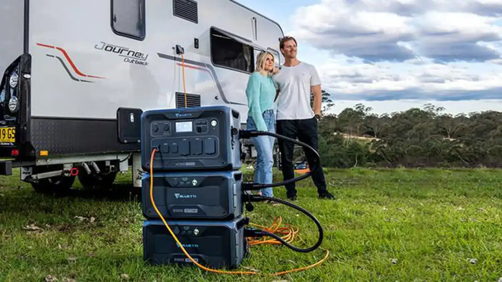 people outdoors by a camper and BLUETTI products