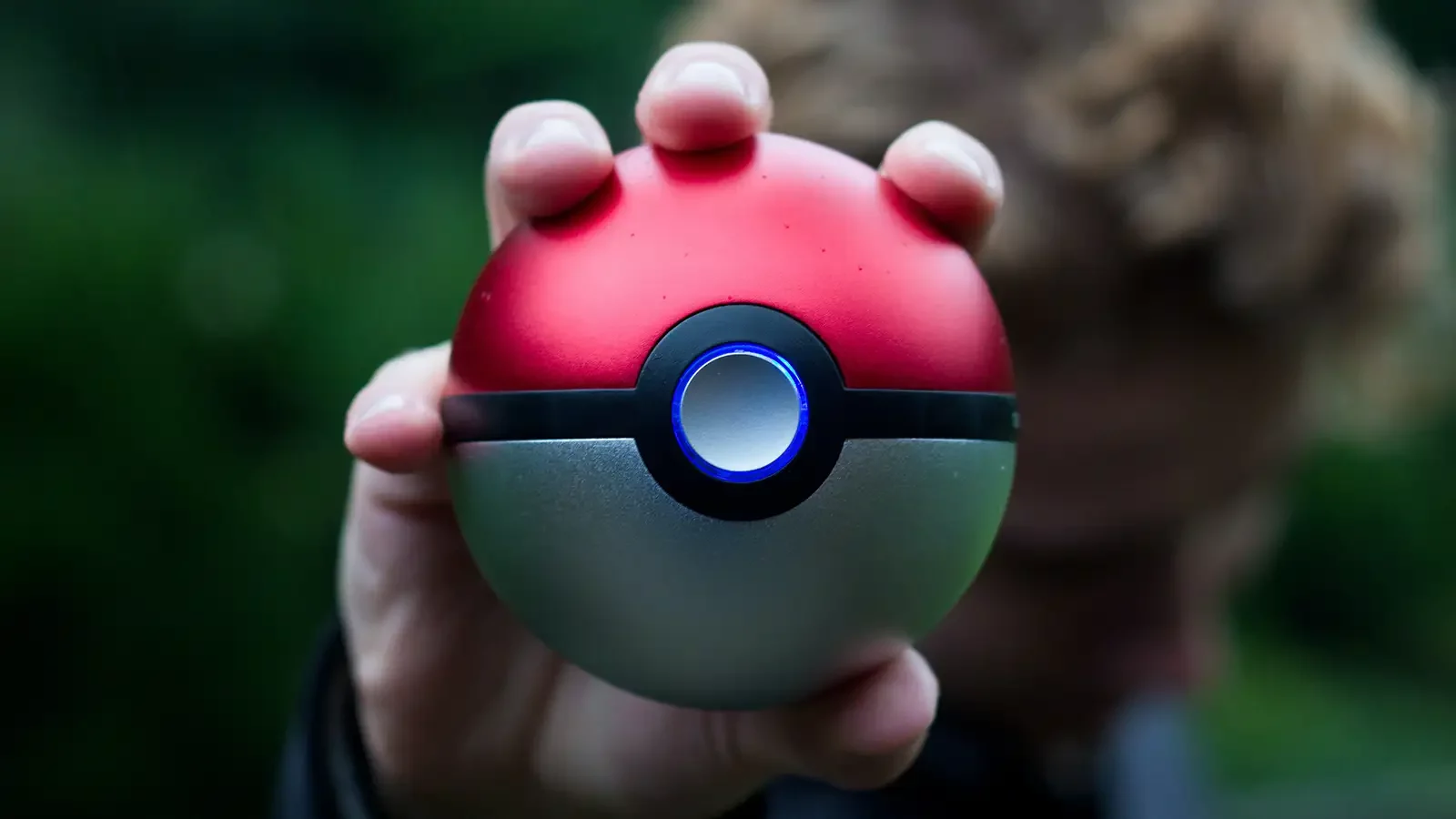 Pokemon ball in hand