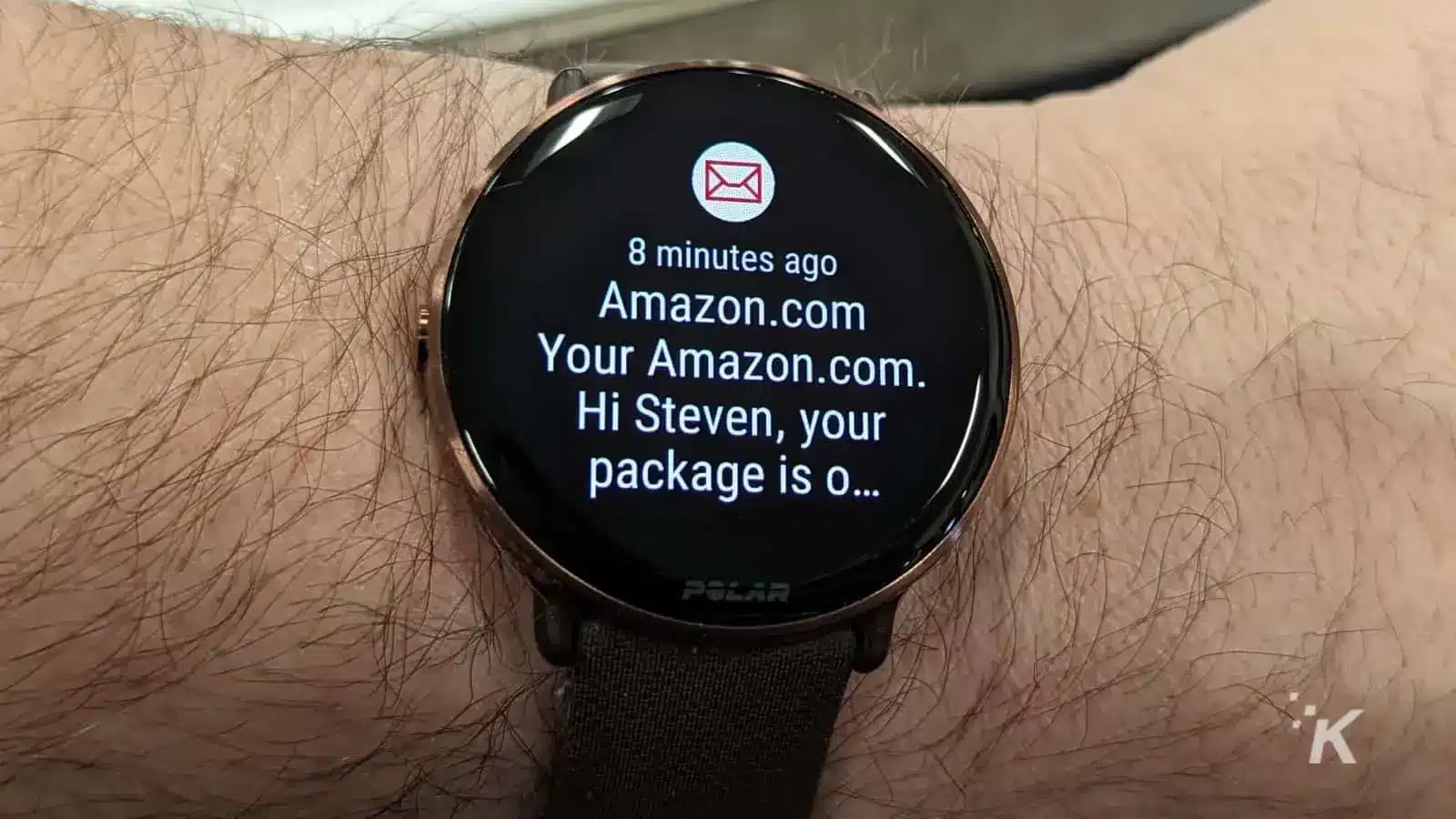 Polar ignite 3 watch showing a notification from amazon on wrist