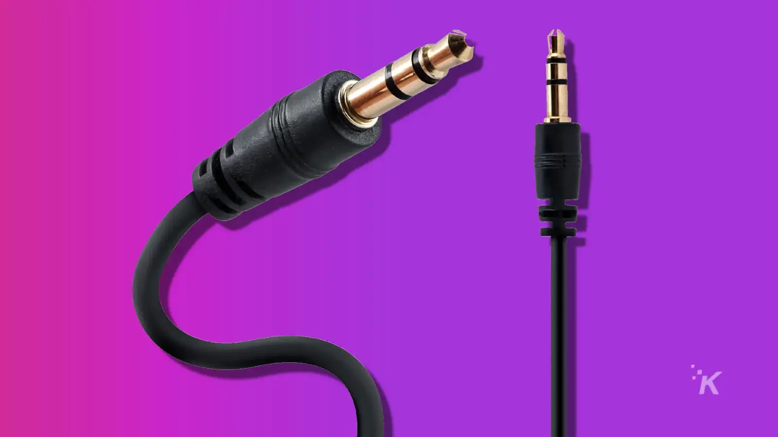 aux cable for a jbl speaker to connect to PC on purple background