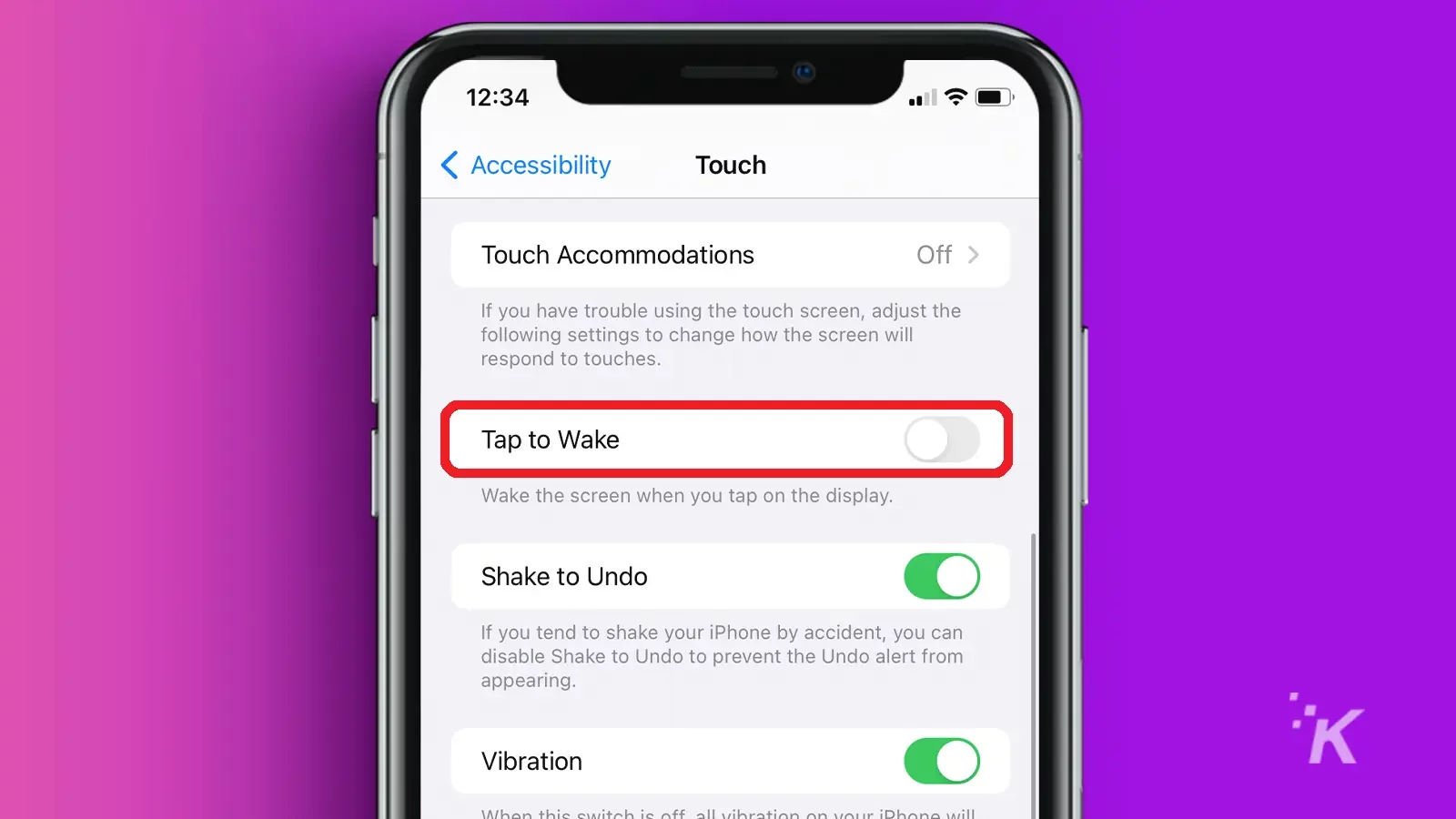 Iphone screen showing tap to wake tab circled red in purple background