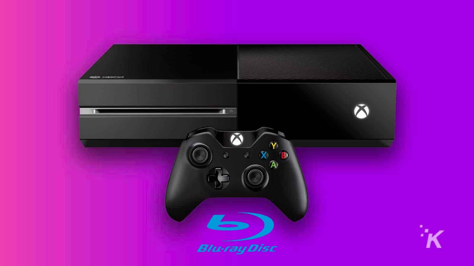 xbox one console and blu ray logo on a purple background