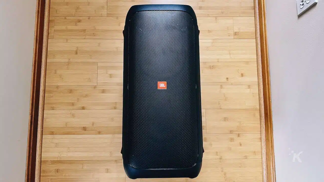 A black case filled with accessories sits indoors.