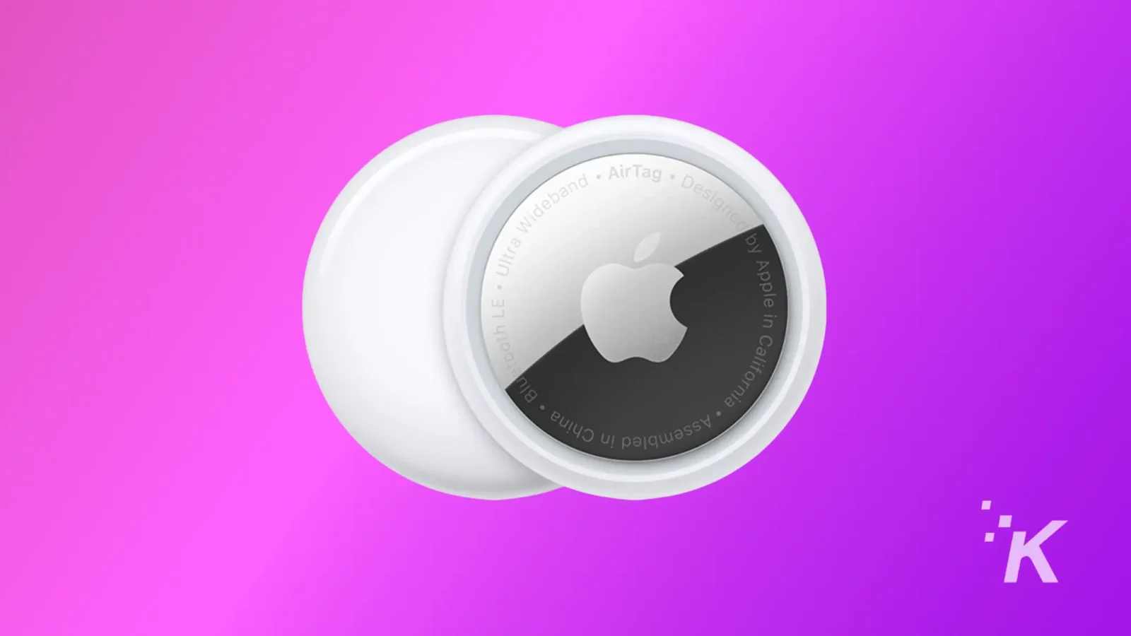 Apple Airtag placing on the purple background