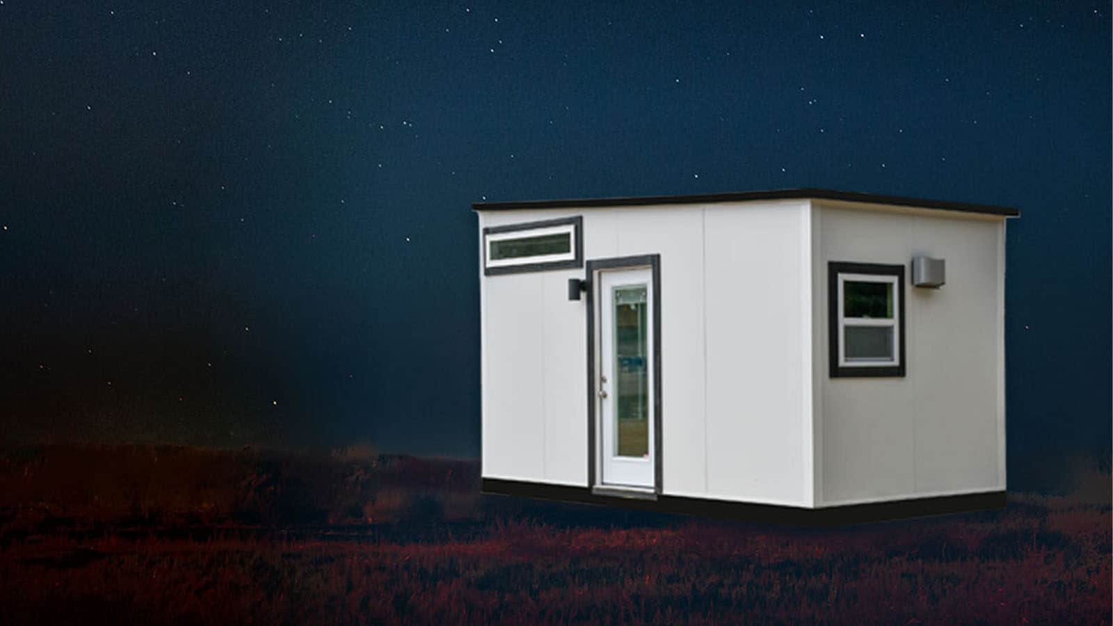 ECLIPSE Tiny home under the stars at night