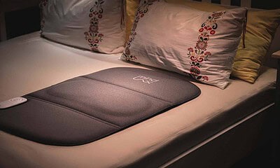 MindLax sleeping mat on bed